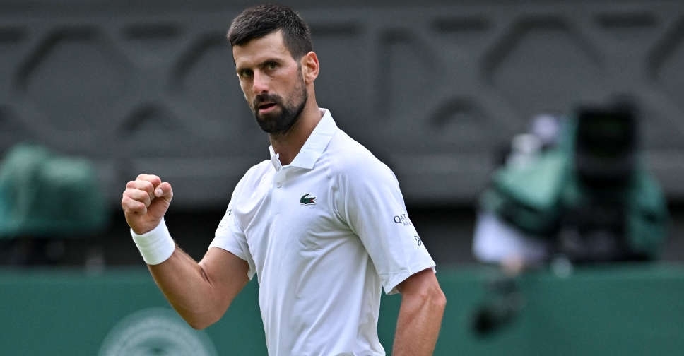 Djokovic hits century to lead veterans into last 16, Krejcikova crashes