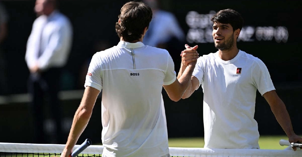 Alcaraz muscles past Fritz to reach Wimbledon final