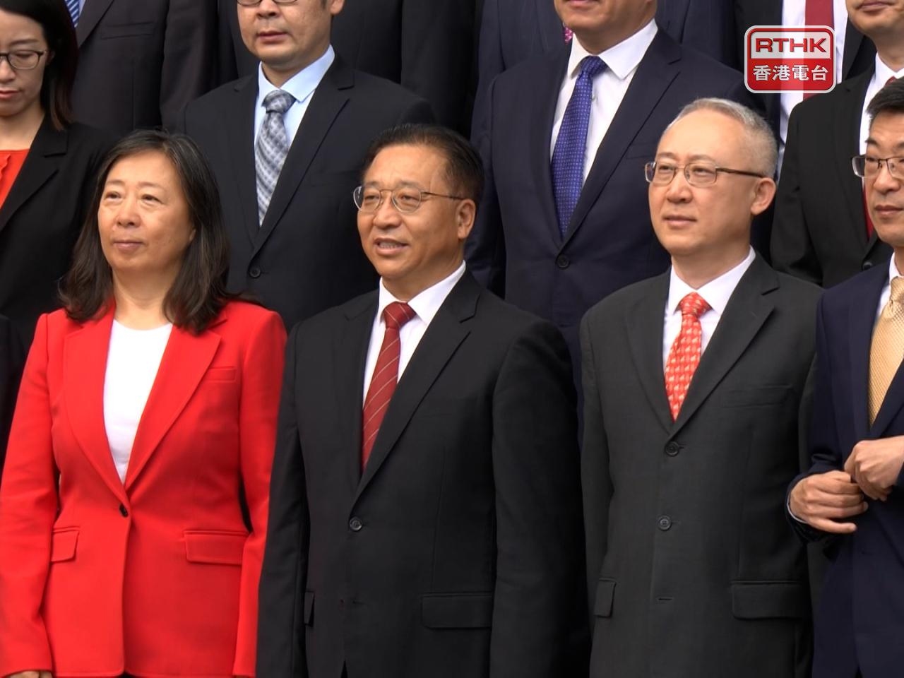 Beijing officials hold flag-raising ceremonies in SAR