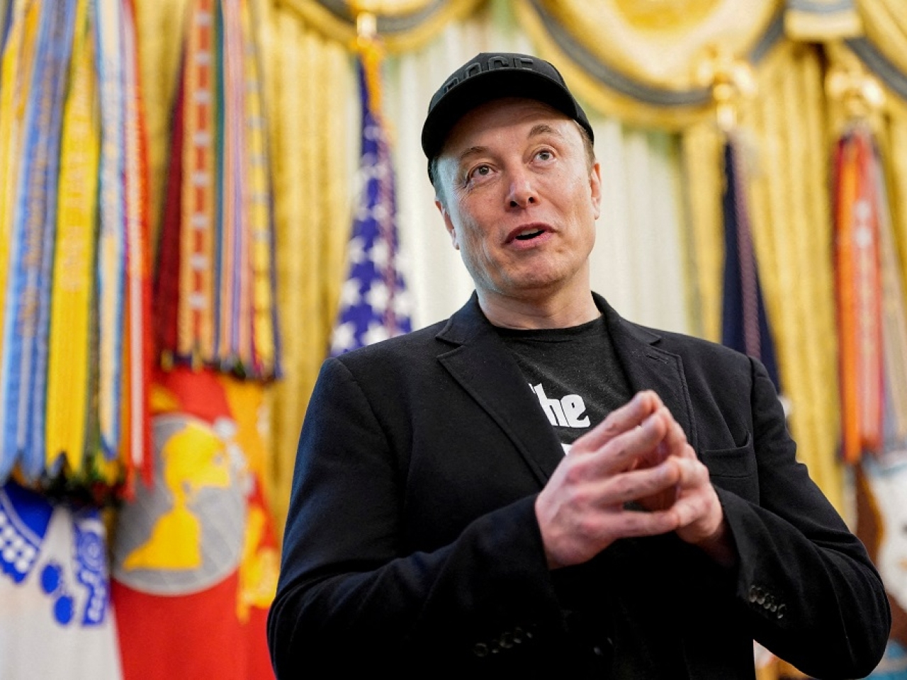 Trump says will 'take a look' at deporting Musk
