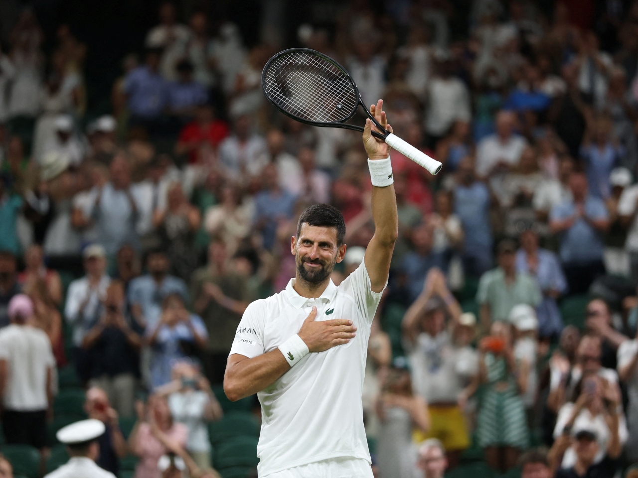 Djokovic opens 25th Grand Slam bid with win