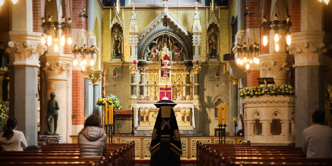 The Fall of a Party at Prayer