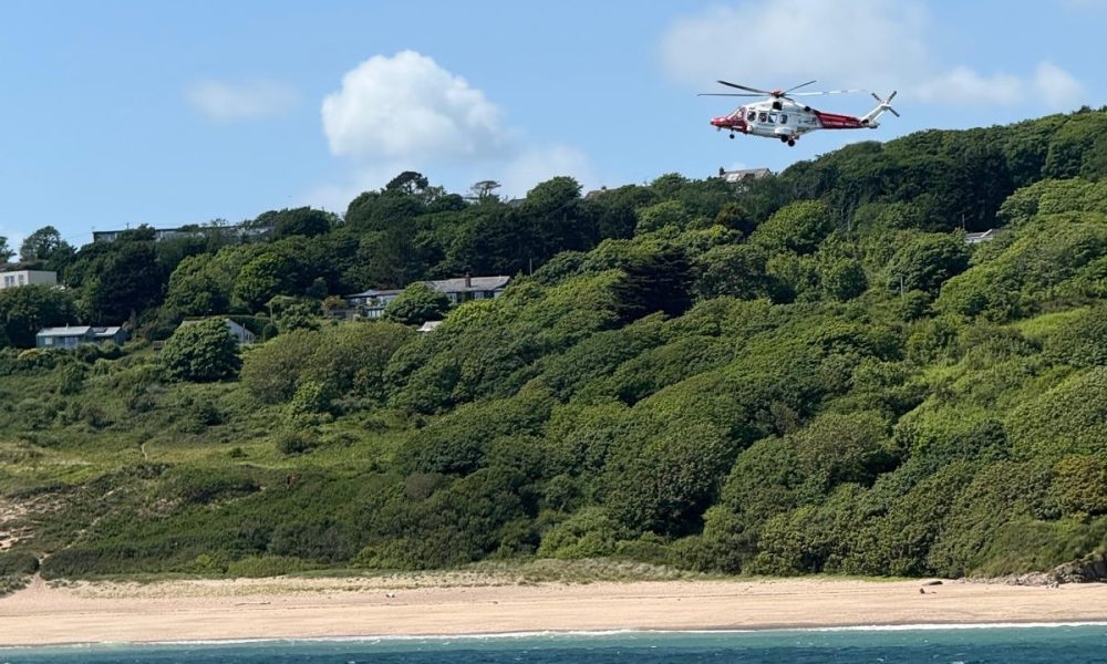 Simultaneous rescues for Tenby lifeboats after paddleboarders blown out to sea