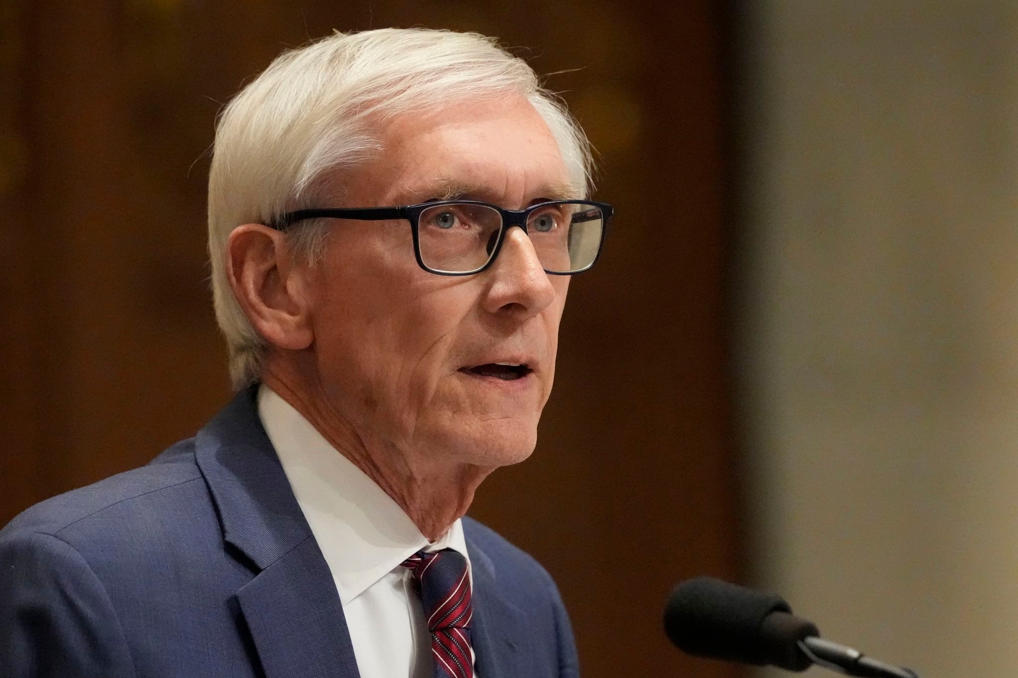 Wisconsin's Democratic governor reaches budget deal with Republicans to cut taxes, fund university