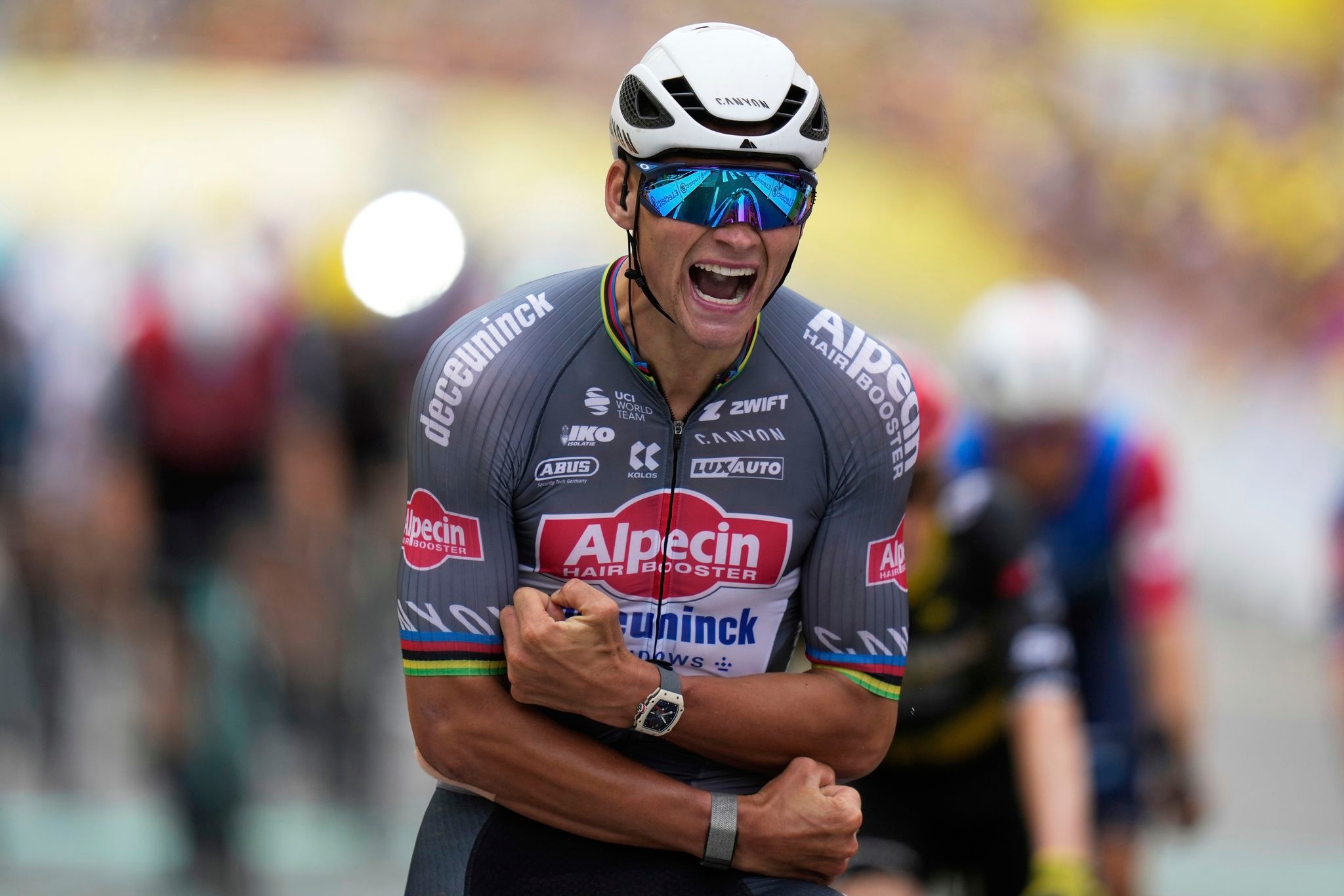 Tour de France: Van der Poel holds off Pogačar to win rainy stage 2