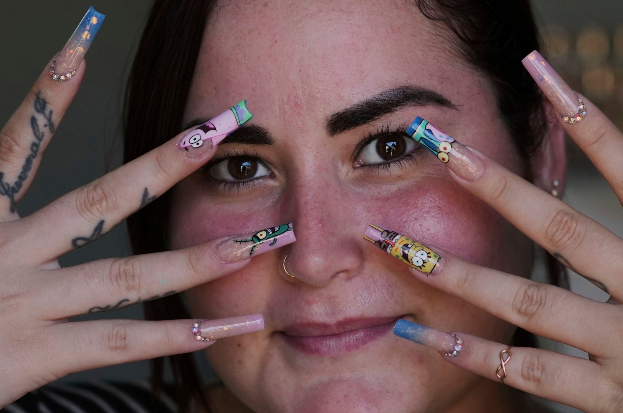 Cuban women embrace extravagant nail art despite economic hardships