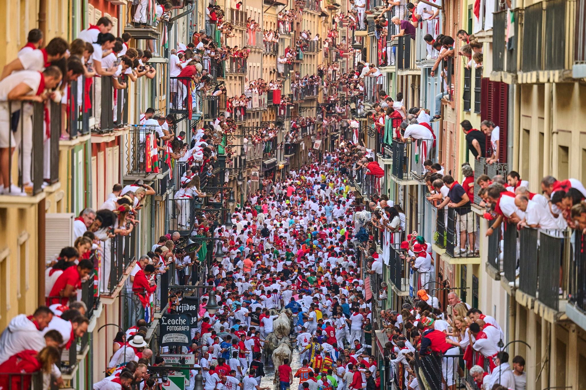 Top photos of thrilling moments and close calls at Spain's San Fermín bull-running festival