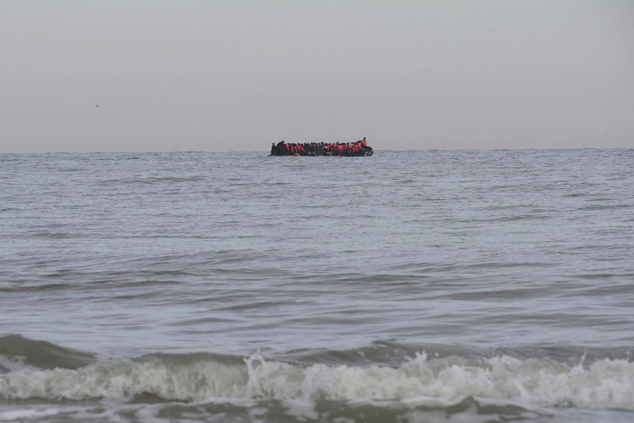 The UK says it will sanction those who enable migrant journeys across the English Channel