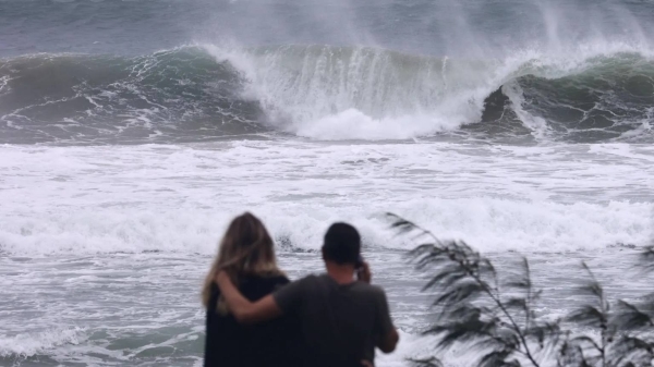 Five dead, two missing as dangerous waves batter Australia's eastern coast