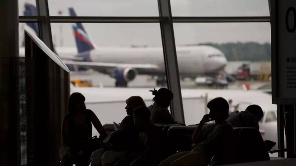 Ukrainian drones disrupt Russian air travel, transport minister fired