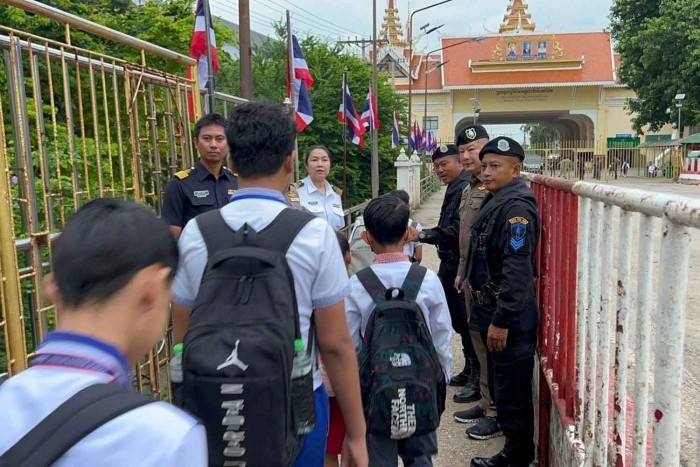 Thailand relaxes some Cambodian border controls to help stranded people, vehicles