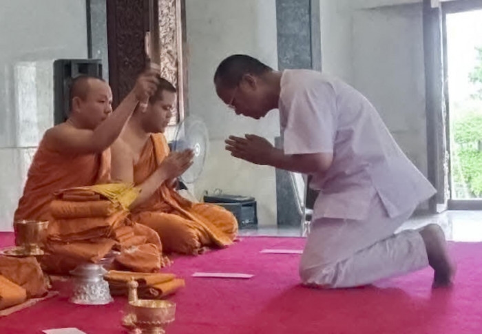 Police probe temple funds as abbot flees