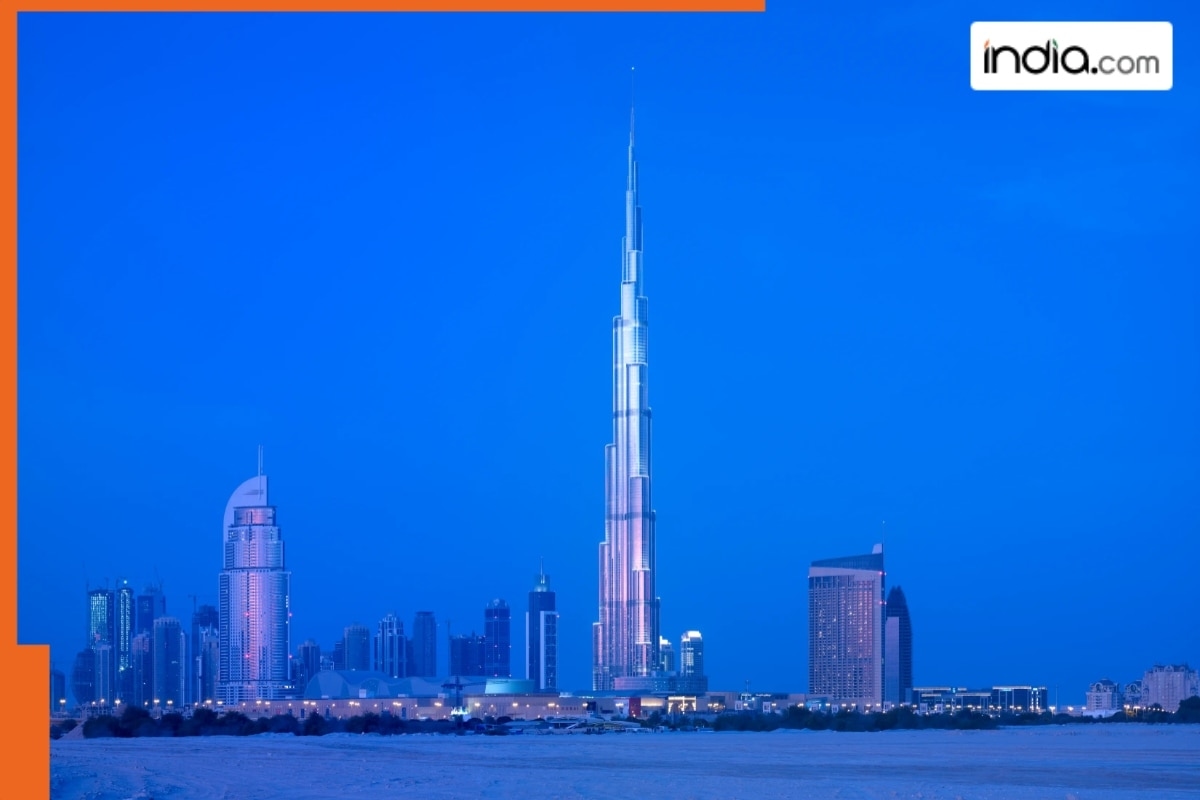Which is world's most beautiful building? It is built on 42 acres, attracts millions of tourists every year, it is…, located in…, not Burj Khalifa in Dubai