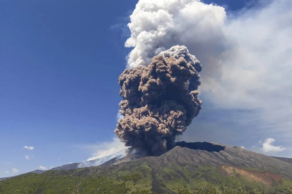 Sicily's Mount Etna Erupts in a Fiery Show of Smoke and Ash Miles High