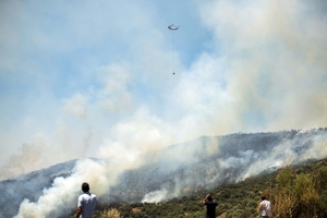 Wildfires spread across Europe