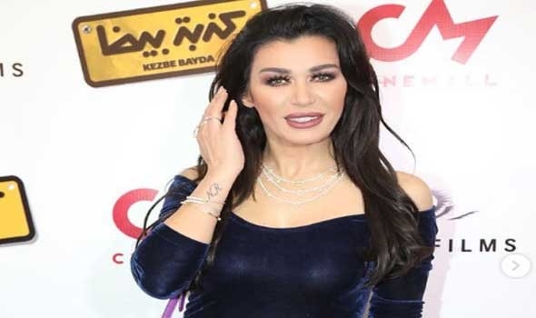 نادين الراسي تكشف تفاصيل ابتزازها وأخذ حضانة طفليها منها