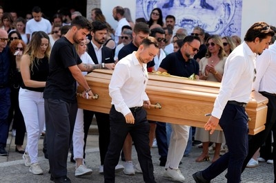 Liverpool and Portugal players join family of Jota and his brother for funeral