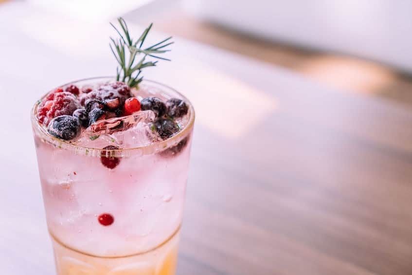 Celebrate World Gin Day with this peach and berry gin fizz cocktail