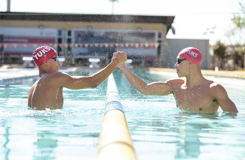 East swimming brothers chase global greatness