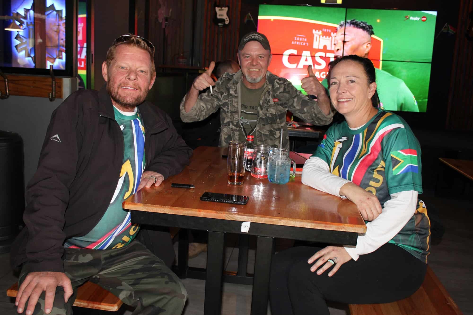 Fans wearing Springbok jerseys back national team