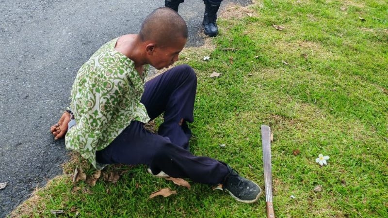Held – foreigner on rampage with a machete