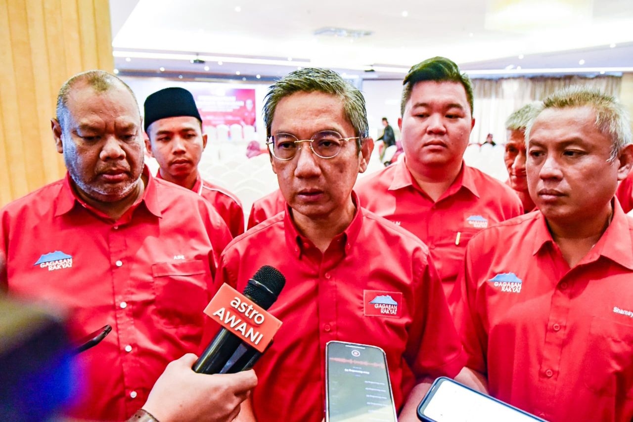 Cooperate and develop Sabah without overlooking local rights