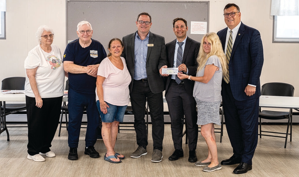 CLOSING THE GAP: Lawmakers present $20,000 for community building project