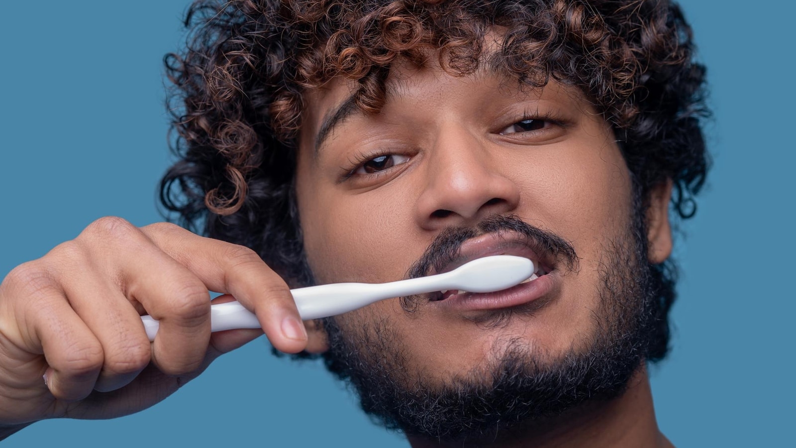Prosthodontist warns brushing your teeth too hard or overbrushing can be dangerous for you and do more harm than good