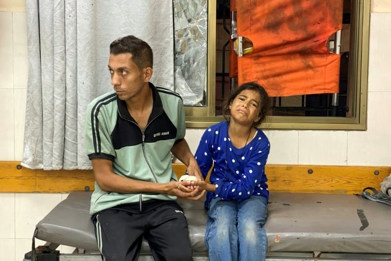 Gaza rescuers say Israeli strikes kill 14 as Trump teases ceasefire push