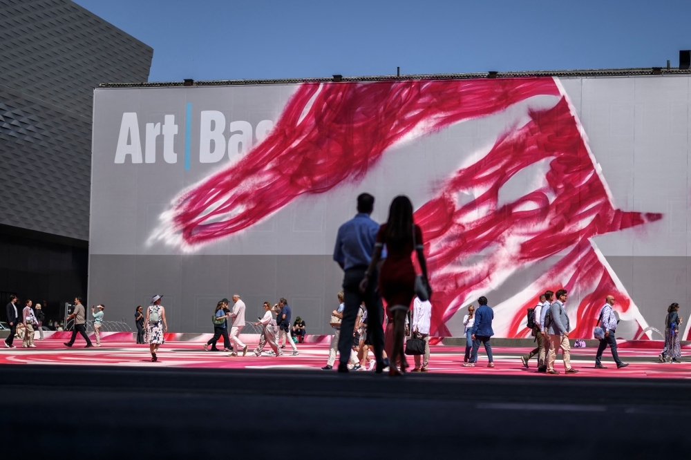 Basel's art fair marches toward utopia — dragging democracy's ghosts along