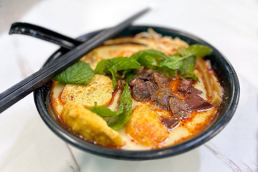 Savour Penang white curry mee, salted butter ‘kopi' and an excellent dry chicken curry ‘wantan mee' at Kopitiam Home Delight in Bandar Teknologi Kajang