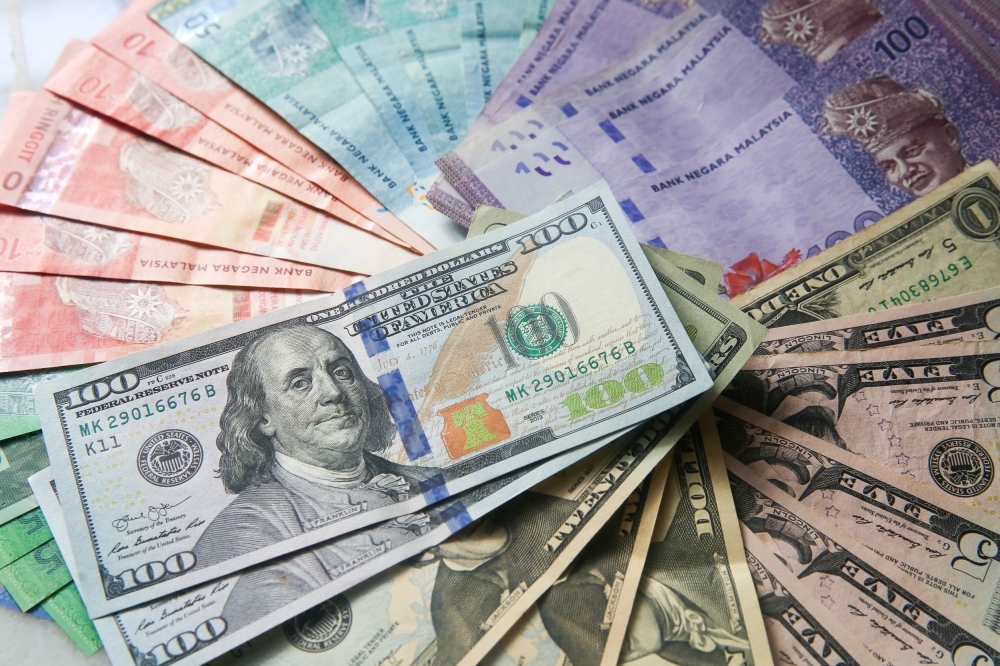 Ringgit climbs as Fed signals patience on rate cuts
