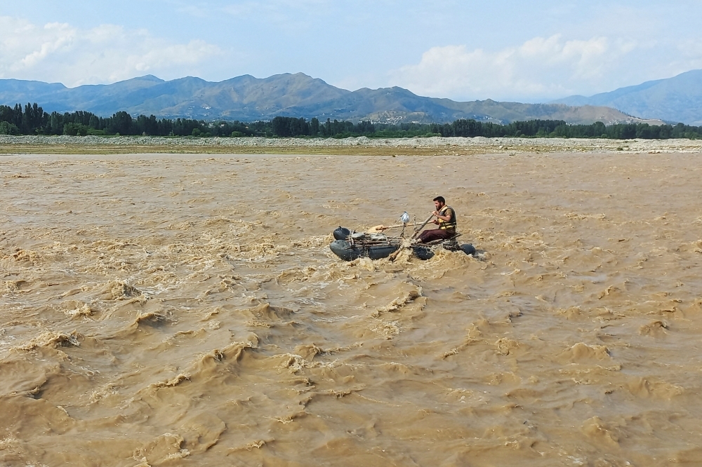 Pakistan flash floods and heavy rains kill 24