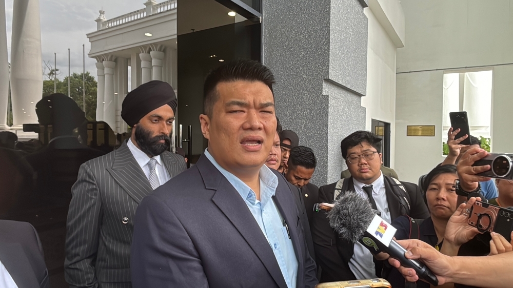 ‘Ikan bilis' charged, ‘sharks' walk free: Businessman cries foul in Sabah graft case