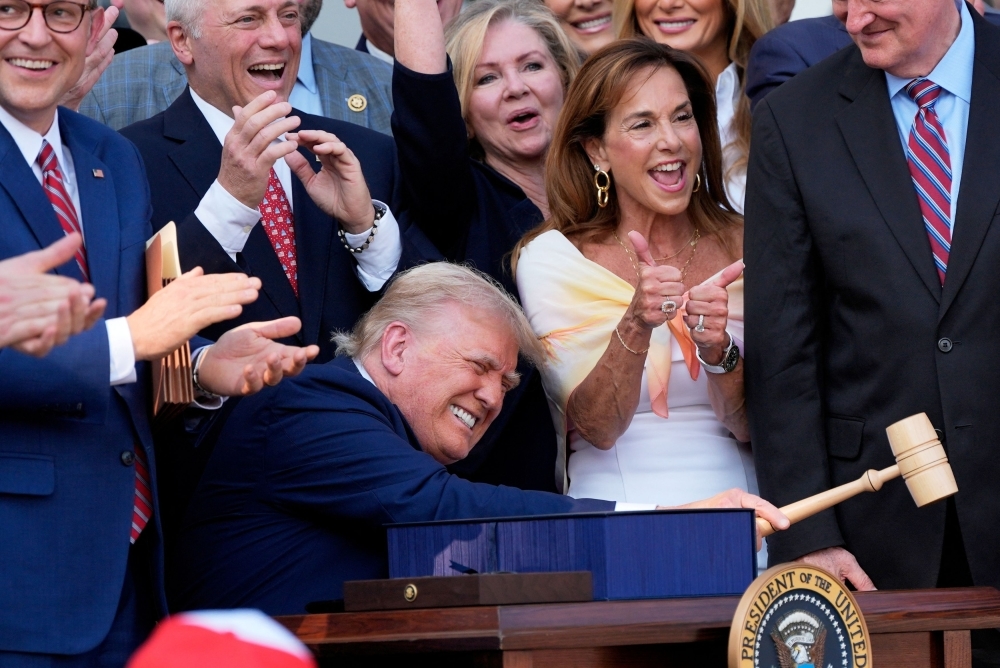 Trump signs sweeping US tax and spending cuts into law amidst Fourth of July spectacle
