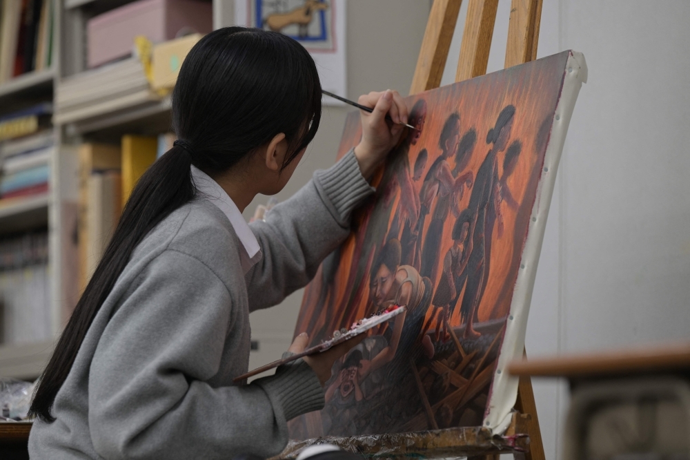 Hiroshima's young artists bring atomic bomb survivors' stories to life on canvas