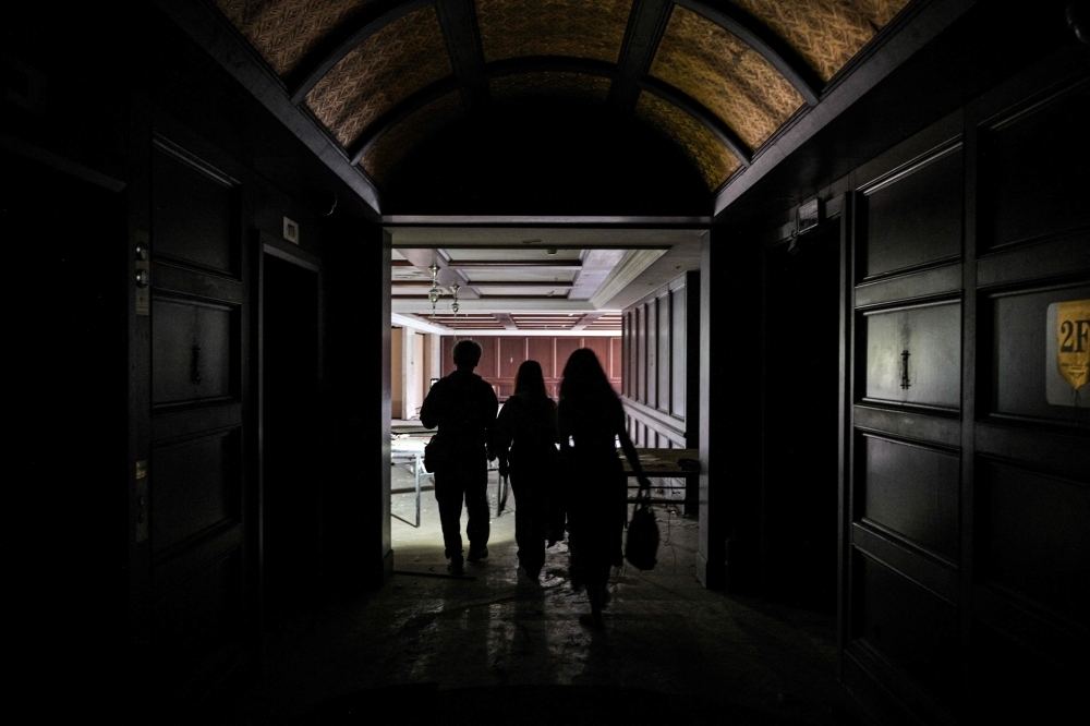 Urban explorers find beauty in China's abandoned buildings amid property crisis