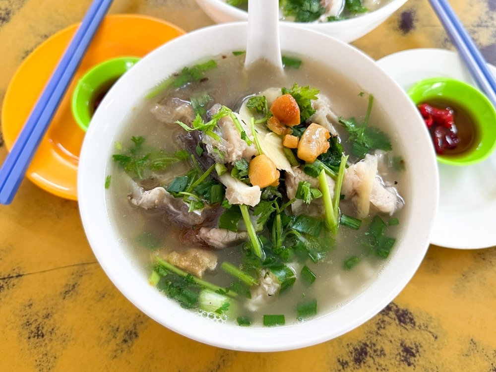 Put Pudu's Restoran San Jee on your bucket list for their feel-good fish head noodles with fresh fish and a wonderful chicken-pork broth