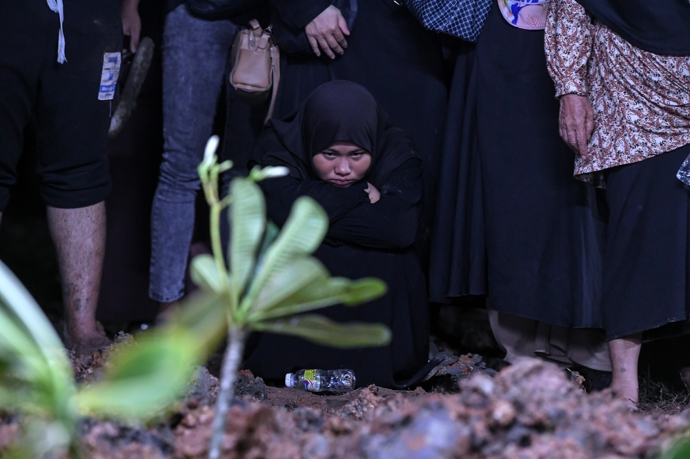 Putri Qisya, 12, vows to stay strong after losing parents, four siblings in Sungai Korok tragedy