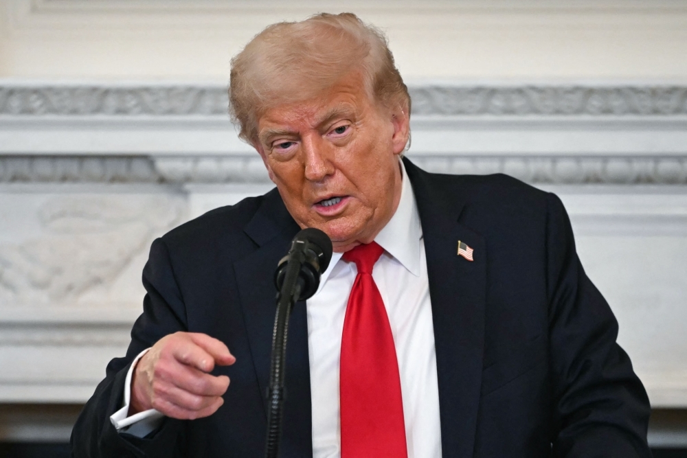 Trump warns Russia to end Ukraine war in 50 days or face 100pc tariffs