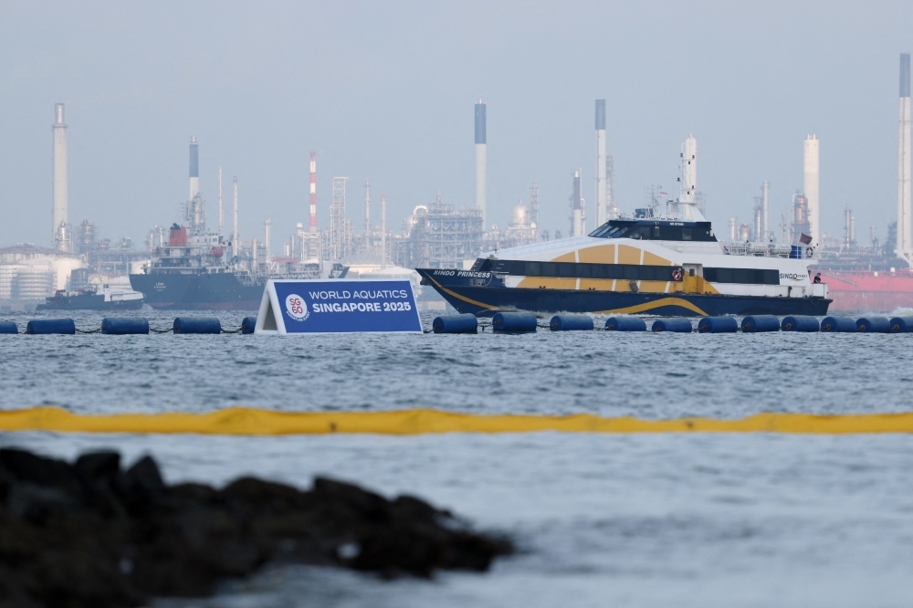 Swimmers left waiting: World championships in Singapore postponed over poor water quality