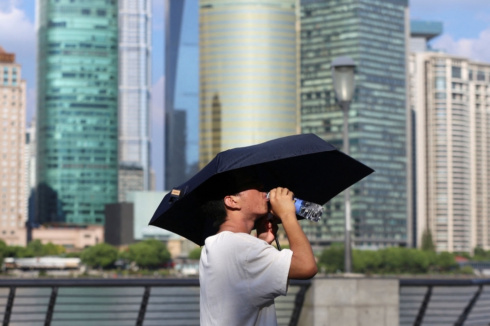 China's power grid on edge as record heat drives energy demand to breaking point
