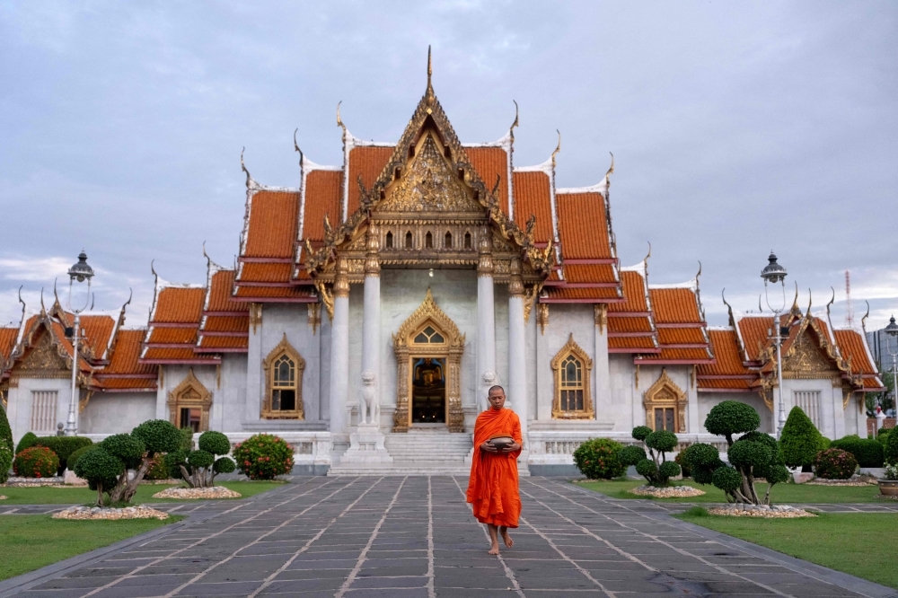 Sex, lies and saffron robes: US$12m blackmail scandal shakes Thai Buddhism