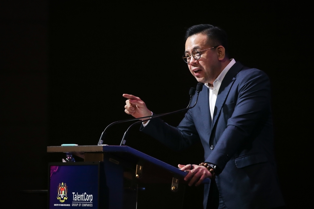‘Don't play the fool with workers': HR minister warns Johor bus firm after strike over pay cuts affects Causeway commuters
