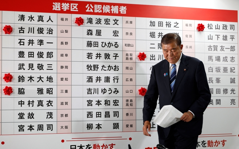 As Japan flounders, LDP hunts for a new face to lead