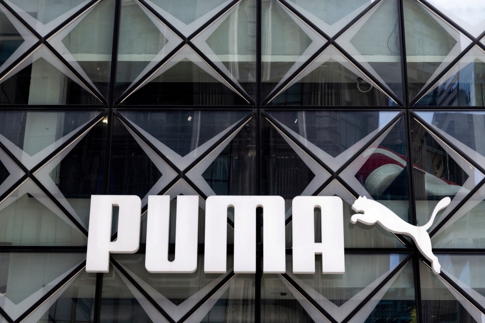 Puma shares tumble 20pc after profit warning, sales downgrade