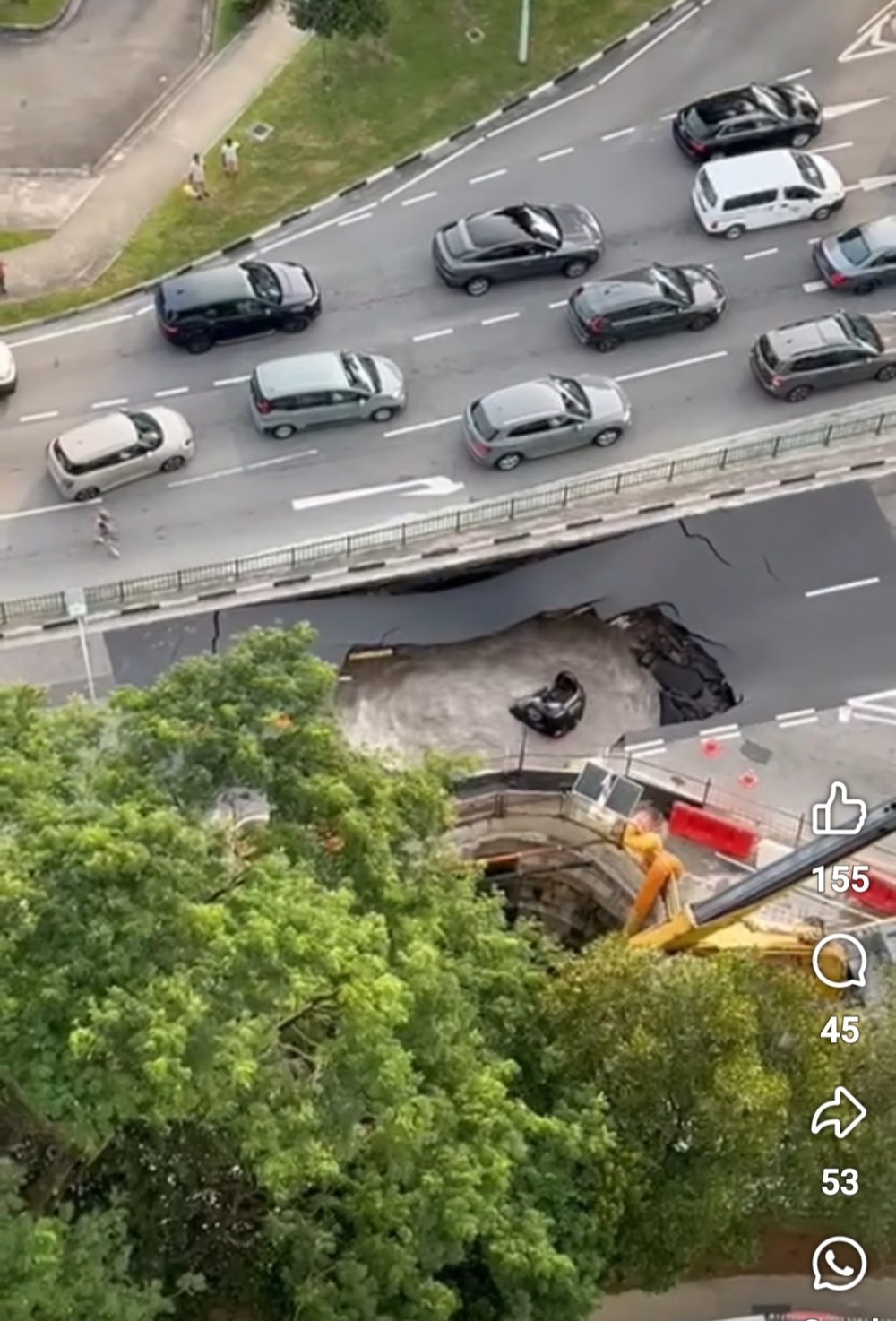 Woman hospitalised after car plunges into sinkhole on Singapore's Tanjong Katong Road