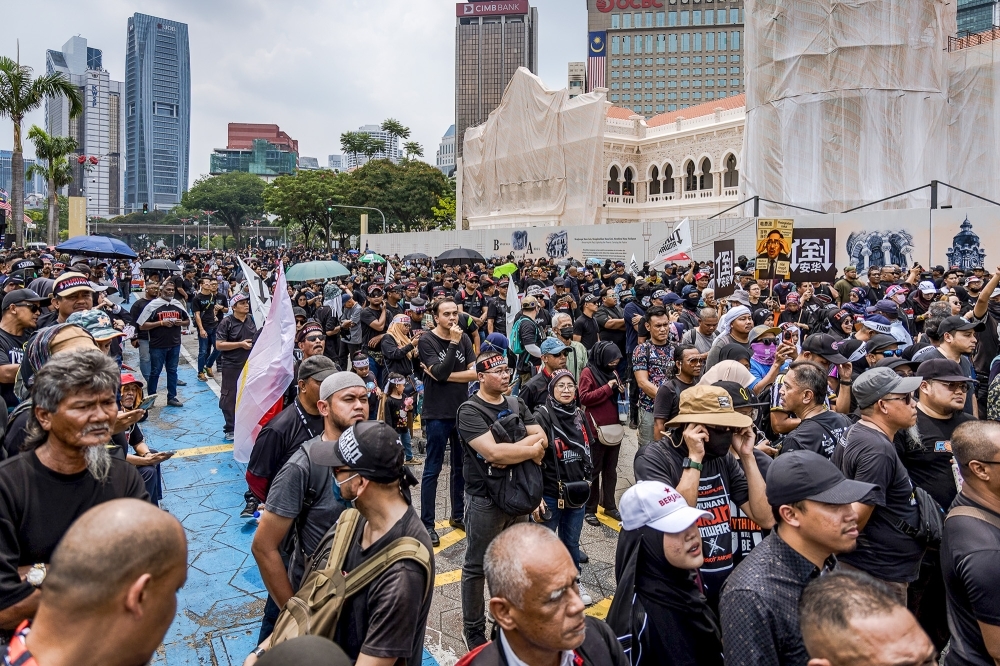 Four reports filed over ‘Turun Anwar' rally, police to investigate effigy caning and drone use