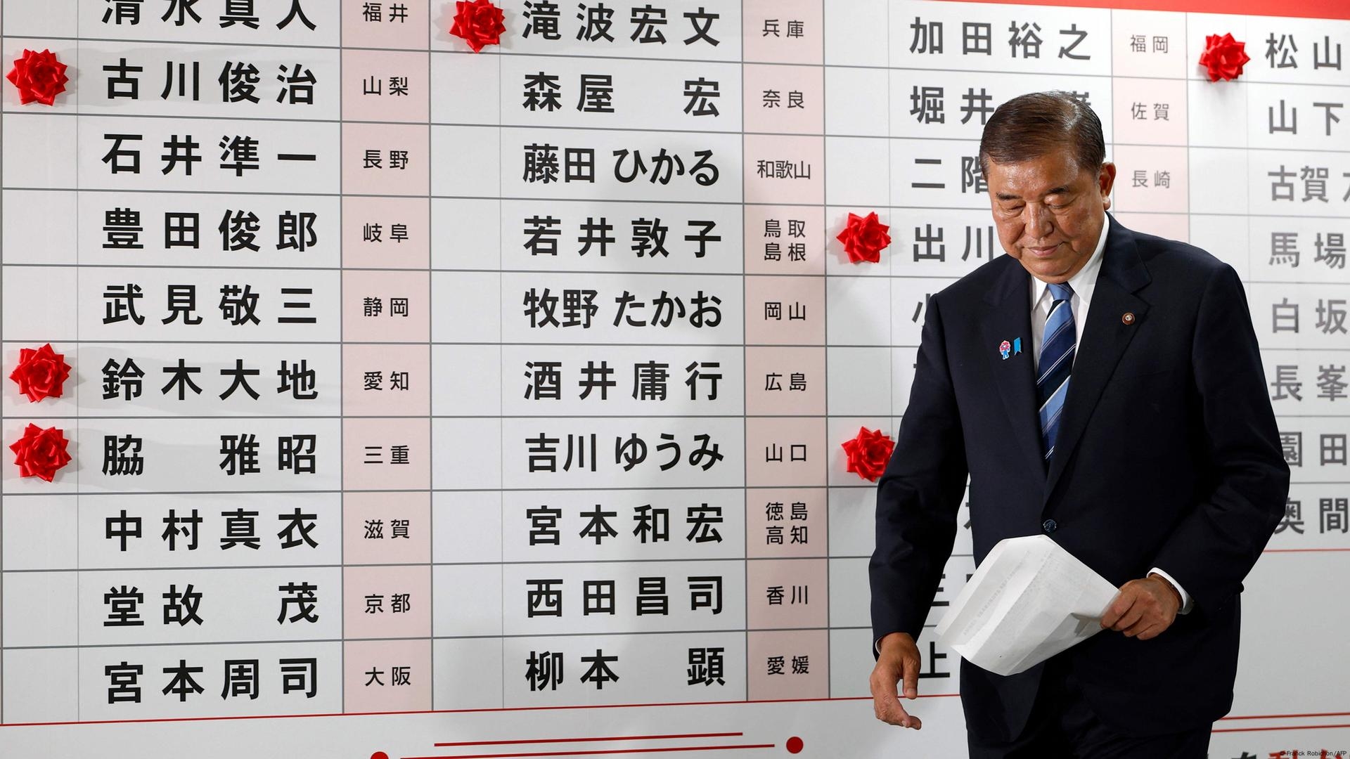 Japan's Ishiba vows to stay on after election defeat