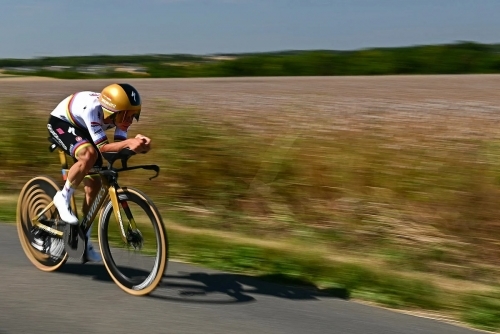 Pogacar into yellow as Evenepoel wins Tour de France time trial